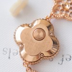 Van Cleef & Arpels watch with white mother-of-pearl and diamond-set clover dial
